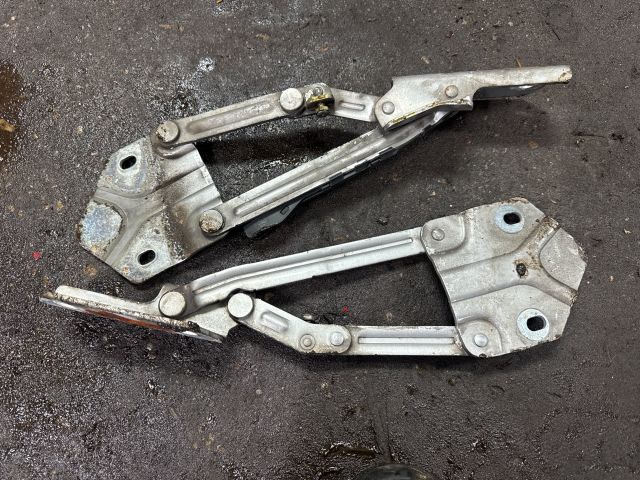 bontott VW CADDY Motorháztető Zsanér Pár