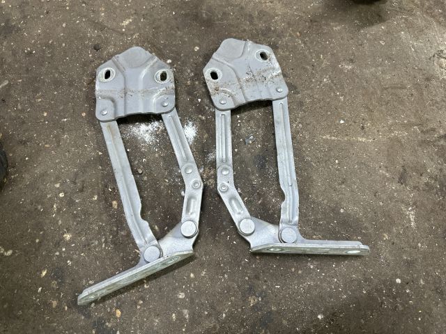 bontott VW CADDY Motorháztető Zsanér Pár