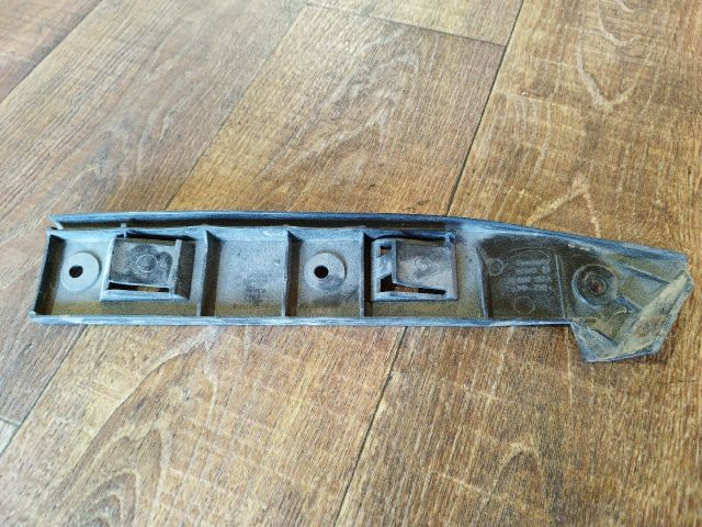 bontott VW GOLF IV Bal első Oldal Lökhárító Tartó (Műanyag)