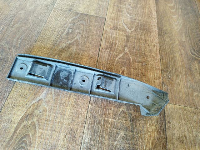 bontott VW GOLF IV Bal első Oldal Lökhárító Tartó (Műanyag)