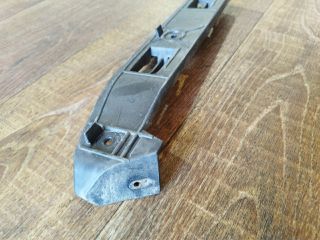 bontott VW GOLF IV Bal első Oldal Lökhárító Tartó (Műanyag)