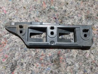 bontott VW GOLF V Bal első Oldal Lökhárító Tartó (Műanyag)