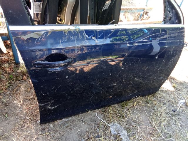 bontott VW GOLF V Jobb első Ajtó (Üres lemez)