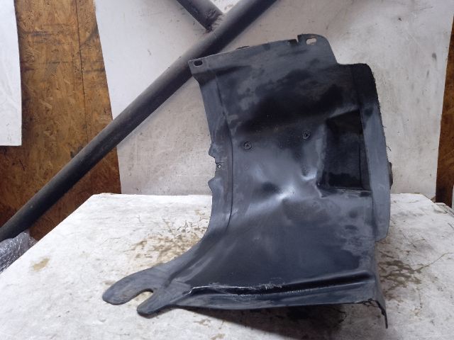 bontott VW GOLF V Jobb első Hátsó Dobbetét (Kerékjárati, Műanyag)