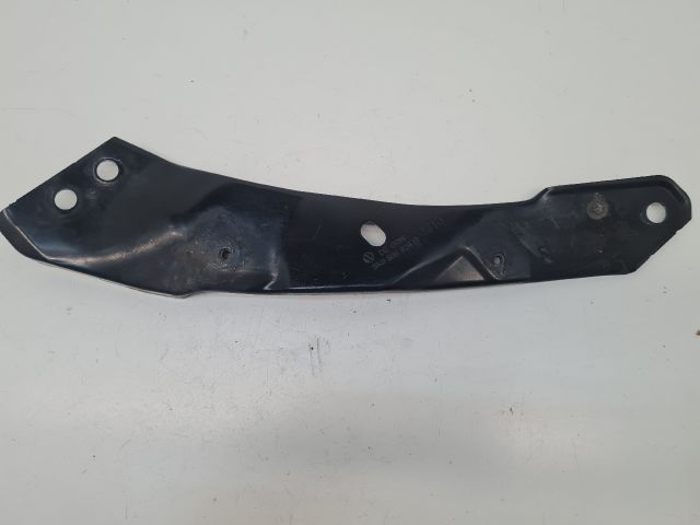 bontott VW GOLF VI Bal Fényszóró Tartó