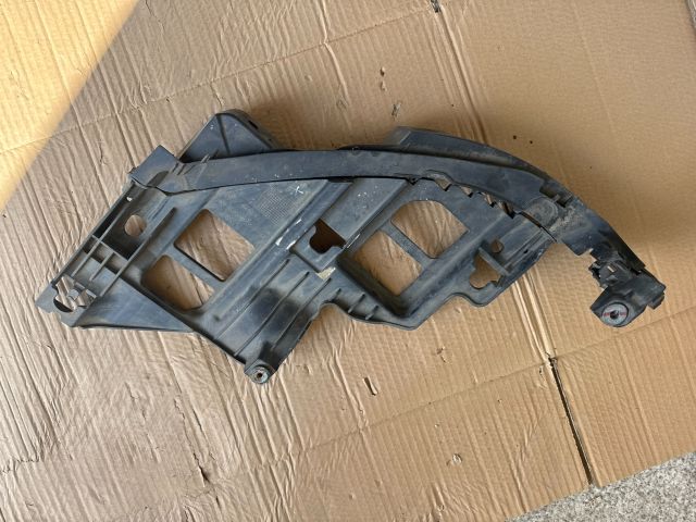 bontott VW GOLF VI Bal Fényszóró Tartó