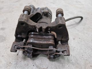 bontott VW GOLF VII Bal hátsó Féknyereg Munkahengerrel