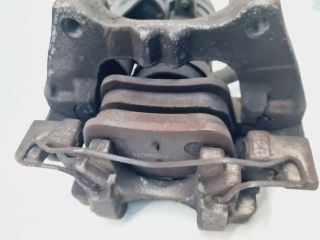 bontott VW GOLF VII Bal hátsó Féknyereg Munkahengerrel