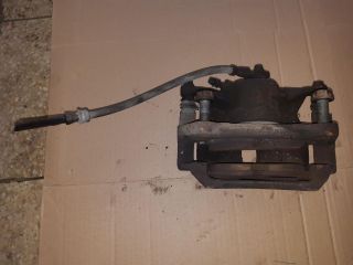 bontott VW GOLF VII Bal első Féknyereg Munkahengerrel