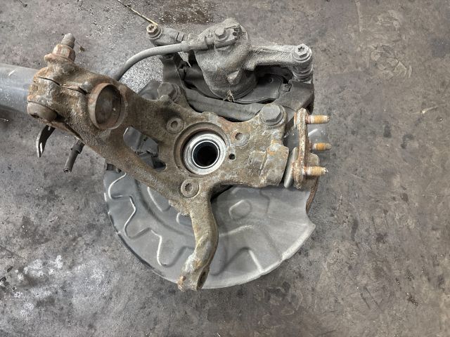 bontott VW GOLF VII Bal első Gólyaláb (Lengécsillapító, Rugó)