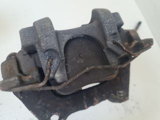 bontott VW GOLF VII Bal hátsó Féknyereg Munkahengerrel