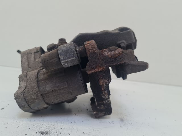 bontott VW GOLF VII Bal hátsó Féknyereg Munkahengerrel