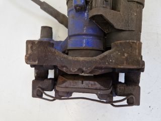 bontott VW GOLF VII Bal hátsó Féknyereg Munkahengerrel