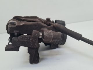 bontott VW GOLF VII Jobb hátsó Féknyereg Munkahengerrel