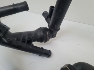 bontott VW GOLF VII Termosztátház Csővel