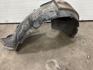 bontott VW GOLF VII Bal első Első Dobbetét (Kerékjárati, Műanyag)