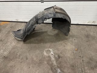 bontott VW GOLF VII Bal első Első Dobbetét (Kerékjárati, Műanyag)