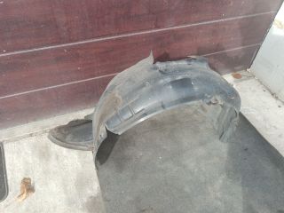 bontott VW JETTA Bal első Dobbetét (Kerékjárati, Műanyag)