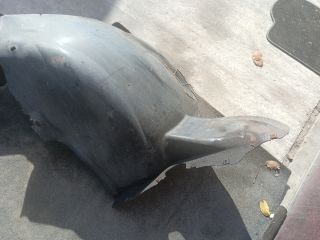 bontott VW JETTA Bal első Dobbetét (Kerékjárati, Műanyag)