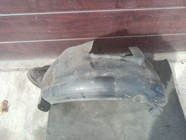 bontott VW JETTA Bal első Dobbetét (Kerékjárati, Műanyag)