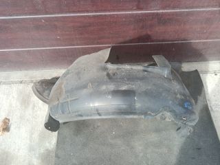 bontott VW JETTA Bal első Dobbetét (Kerékjárati, Műanyag)