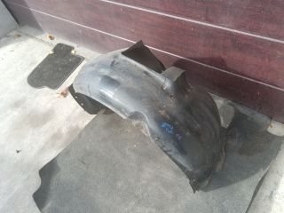 bontott VW JETTA Bal első Dobbetét (Kerékjárati, Műanyag)