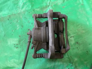 bontott VW PASSAT B8 Bal első Féknyereg Munkahengerrel