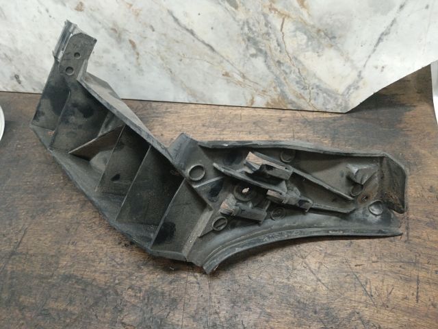 bontott VW POLO IV Bal hátsó Lökhárító Tartó (Műanyag)