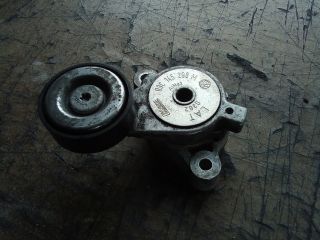 bontott VW TIGUAN Szíjfeszítő Görgő