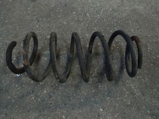 bontott VW TIGUAN Bal első Rugó