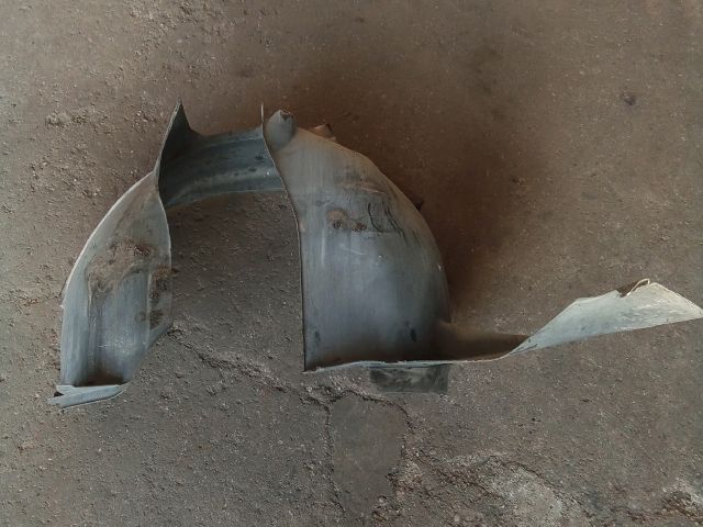 bontott VW TIGUAN Bal első Dobbetét (Kerékjárati, Műanyag)