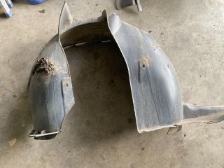 bontott VW TIGUAN Bal első Dobbetét (Kerékjárati, Műanyag)