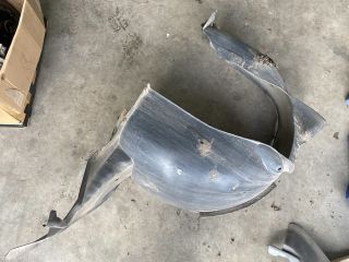 bontott VW TIGUAN Bal első Dobbetét (Kerékjárati, Műanyag)