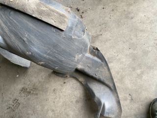 bontott VW TIGUAN Bal első Dobbetét (Kerékjárati, Műanyag)