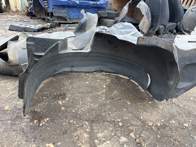 bontott VW TIGUAN Bal első Dobbetét (Kerékjárati, Műanyag)