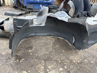 bontott VW TIGUAN Bal első Dobbetét (Kerékjárati, Műanyag)