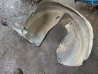 bontott VW TIGUAN Bal első Dobbetét (Kerékjárati, Műanyag)