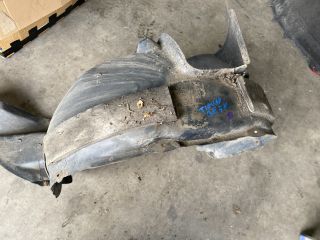 bontott VW TIGUAN Bal első Dobbetét (Kerékjárati, Műanyag)