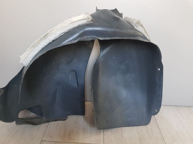 bontott VW TIGUAN Bal első Első Dobbetét (Kerékjárati, Műanyag)