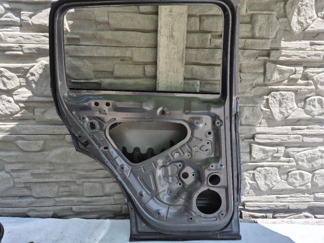 bontott VW TIGUAN Bal hátsó Ajtó (Üres lemez)