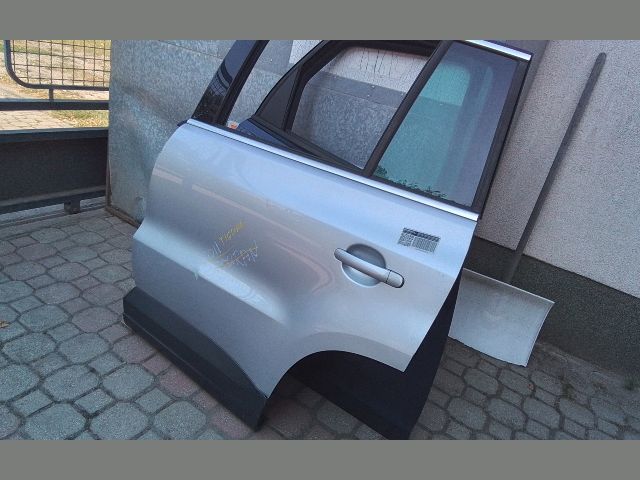 bontott VW TIGUAN Bal hátsó Fixüveg (Ajtóban)