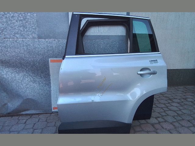 bontott VW TIGUAN Bal hátsó Fixüveg (Ajtóban)
