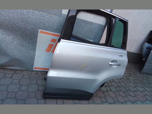 bontott VW TIGUAN Bal hátsó Fixüveg (Ajtóban)