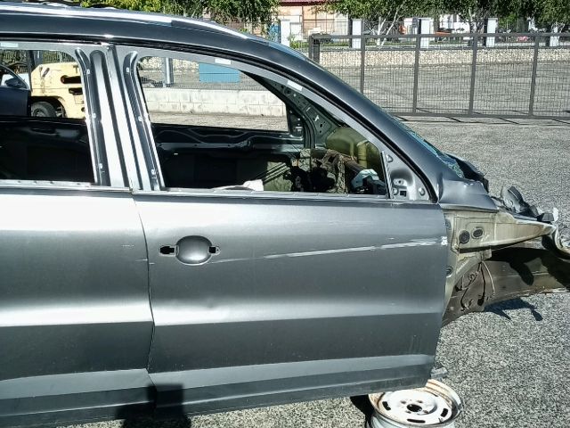 bontott VW TIGUAN Jobb első Ajtó (Üres lemez)