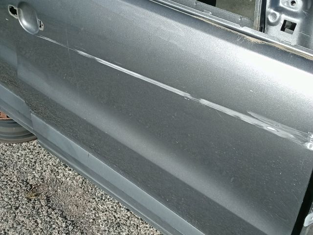 bontott VW TIGUAN Jobb első Ajtó (Üres lemez)