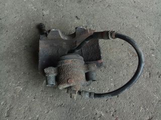 bontott VW TOURAN Bal első Féknyereg Munkahengerrel