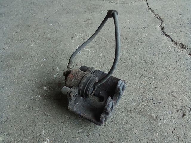 bontott VW TOURAN Jobb első Féknyereg Munkahengerrel