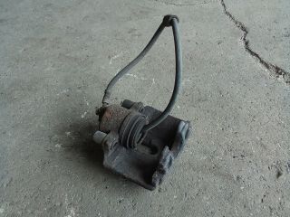 bontott VW TOURAN Jobb első Féknyereg Munkahengerrel