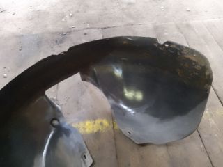 bontott VW TOURAN Bal első Dobbetét (Kerékjárati, Műanyag)