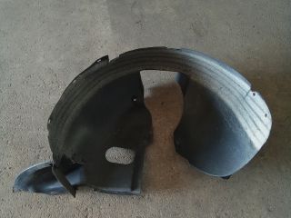 bontott VW TOURAN Bal első Dobbetét (Kerékjárati, Műanyag)